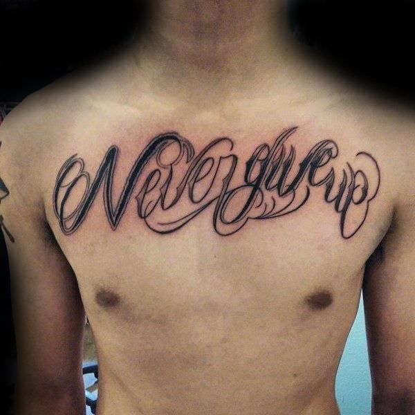 Мужская тату на груди: надпись с переводом - никогда не сдавайся
